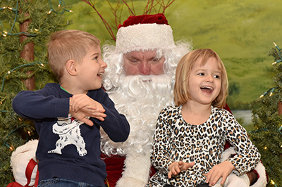 Kids Laughing on Santa's Lap